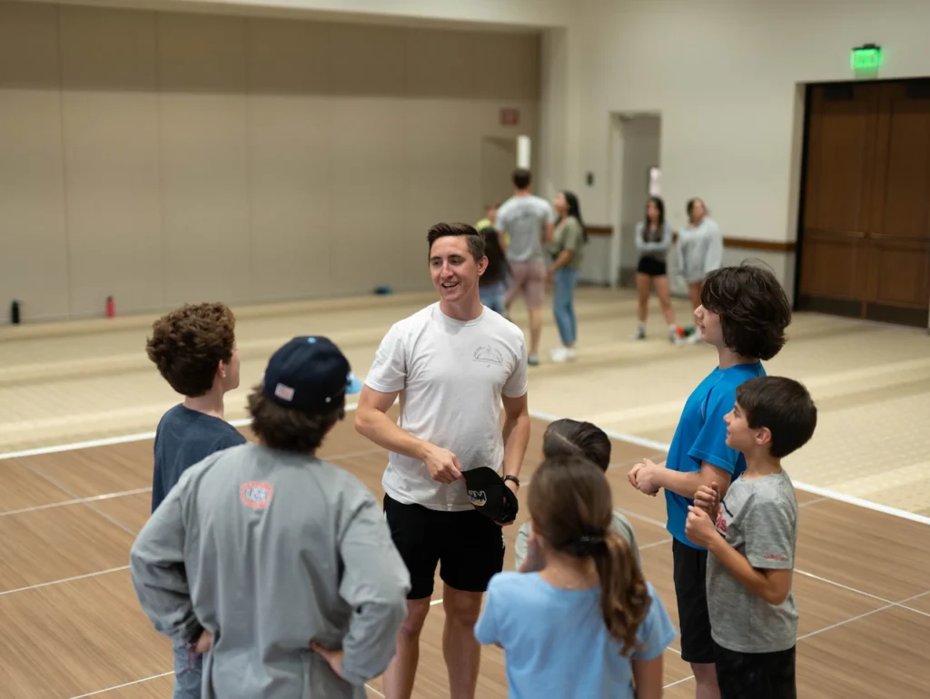 Group of kids learning indoor sports together